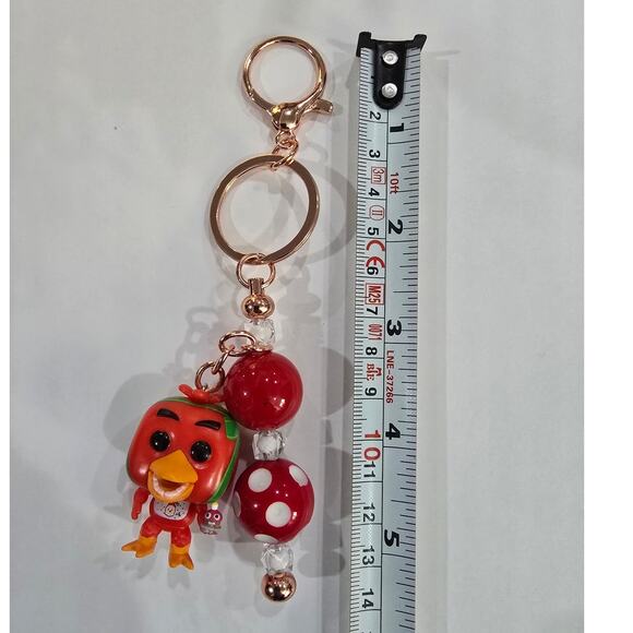 Handmade Beaded Keychain With Reworked Mini Figure - Picture 5 of 10